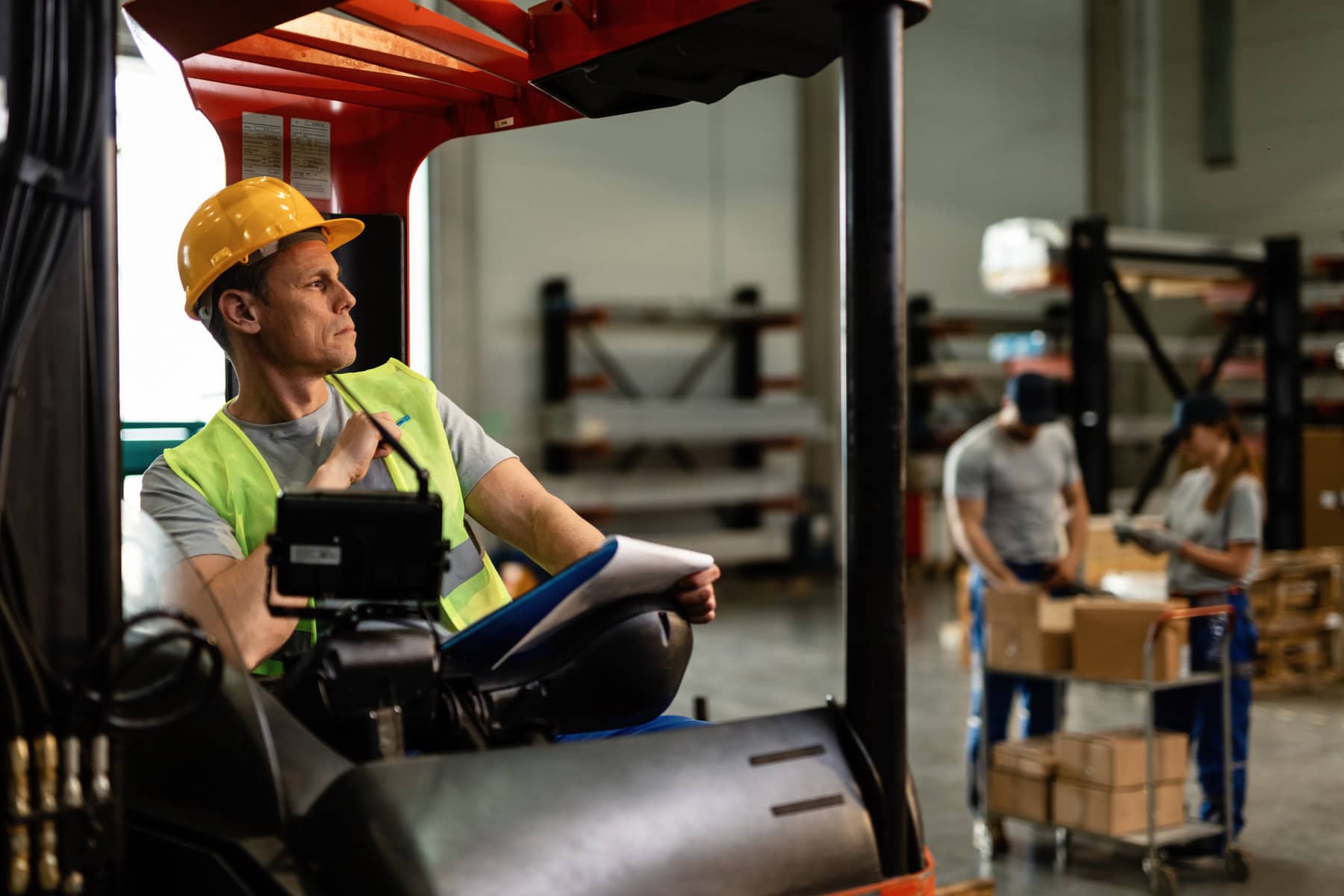 Golf cart driver in an industrial facility